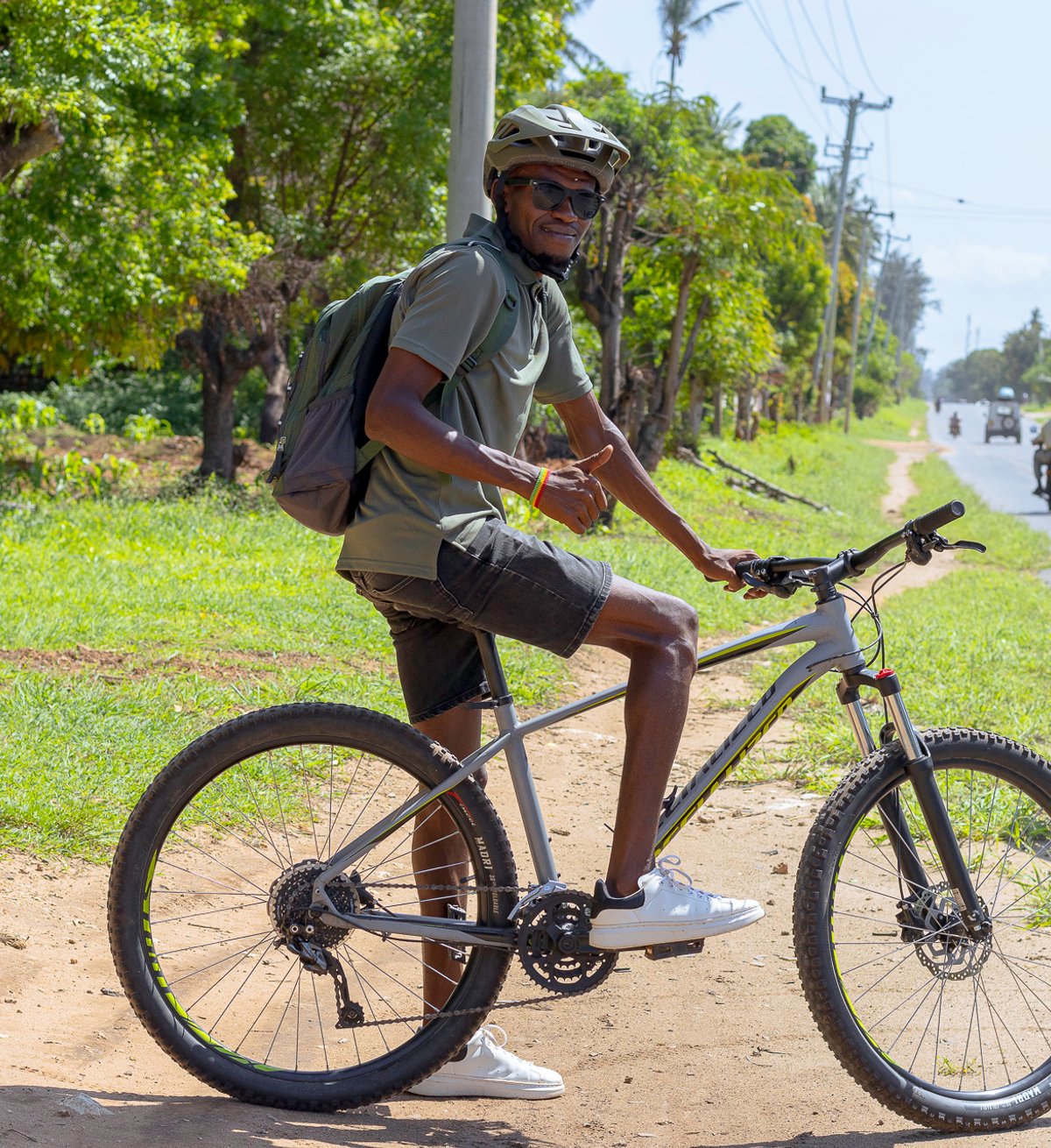 a group of explorers cycling through the mangroves